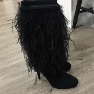 Feather/fringe heel boots.